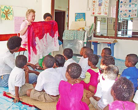 Praying for children with special needs in orphanages and schools in Fiji