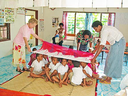 Praying for children with special needs in orphanages and schools in Fiji